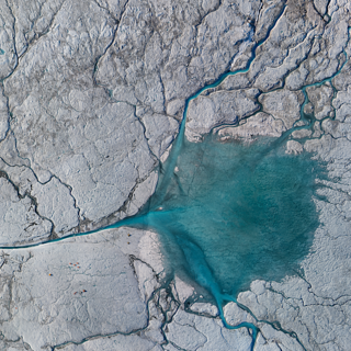 Image of melt water on surface of Greenland