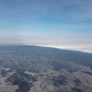 Photo of a section of the North Water Polynya and adjacent sea ice seen during an Operation IceBridge flight on April 19, 2016.