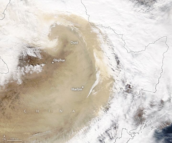 Aqua satellite image showing a thick swirl of dust over China’s Harbin, Changchun, and Shenyang provinces on March 22, 2023.