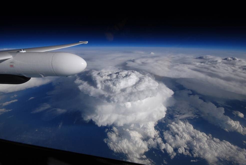 ER-2 aircraft flies over a storm system in North Carolina during the Integrated Precipitation and Hydrology Experiment. Credits: NASA/Stu Broce