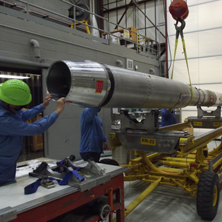 The EVE payload is loaded onto a cart for transport at the White Sands Missile Range.